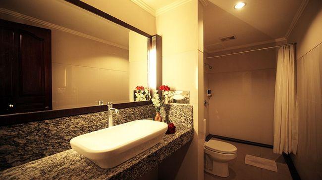 Urbanview Hotel Taman Suci Denpasar Værelse billede